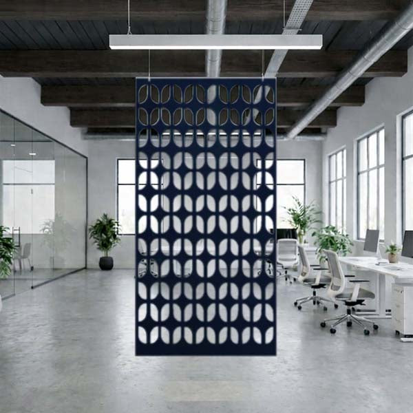 Decorative screen with geometric pattern in an office setting