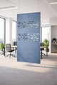 Ocean Green acoustic hanging divider in an office setting with desks and chairs.