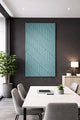 Modern office interior with a geometric Ocean Green wall PET panel on a dark wall.